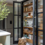 Bespoke pantry larder with reeded glass doors