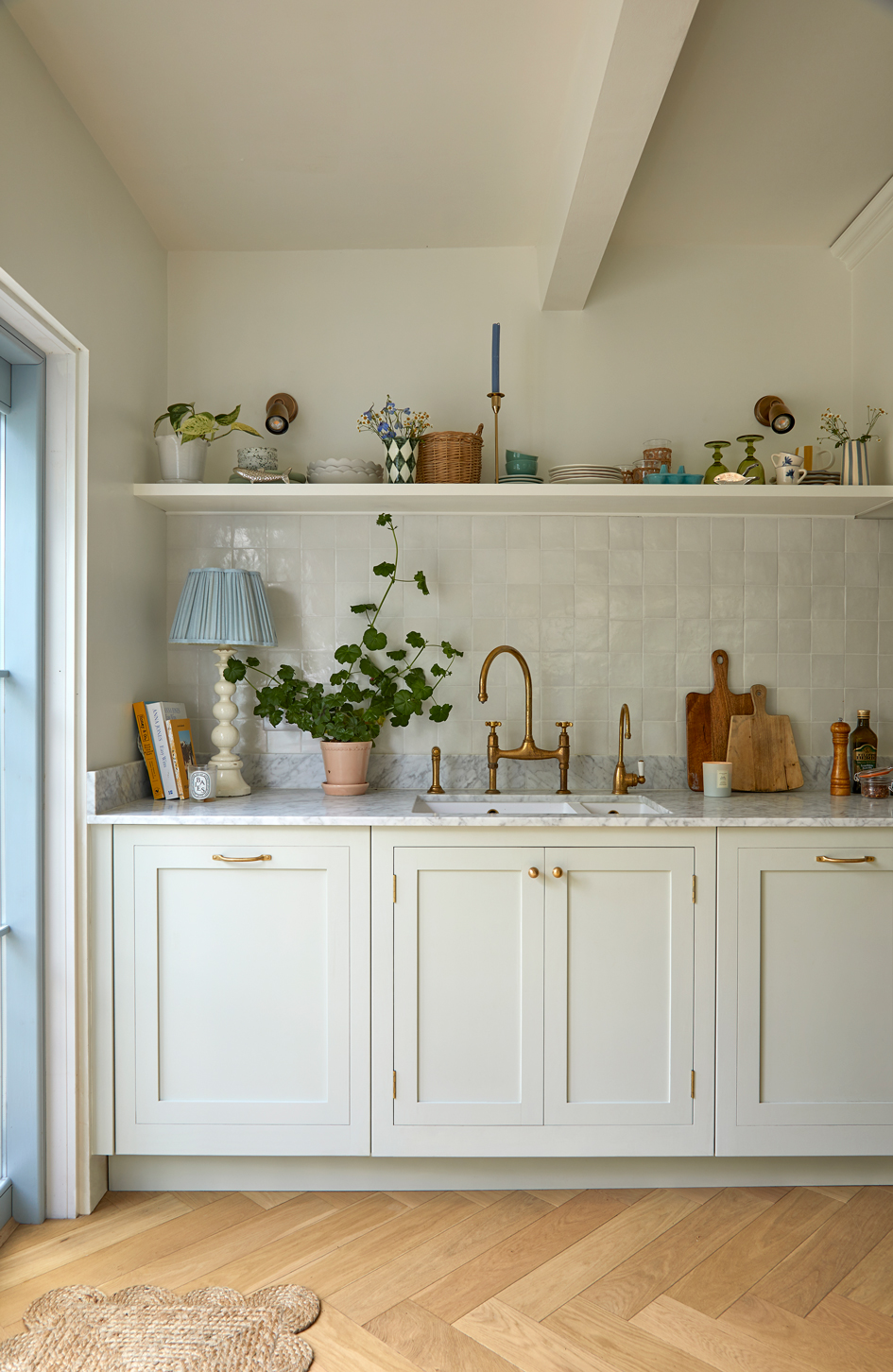 A bespoke kitchen, open shelves, kitchen sink, integrated appliances displays bespoke kitchen, open shelves, kitchen sink, and integrated appliances display a harmonious blend. the open shelves showcase a rustic charm, while the sleek sink seamlessly integrates for functionality. the integrated appliances, artfully arranged, create a space that is both elegant and efficient, inviting you to cook and entertain with ease.