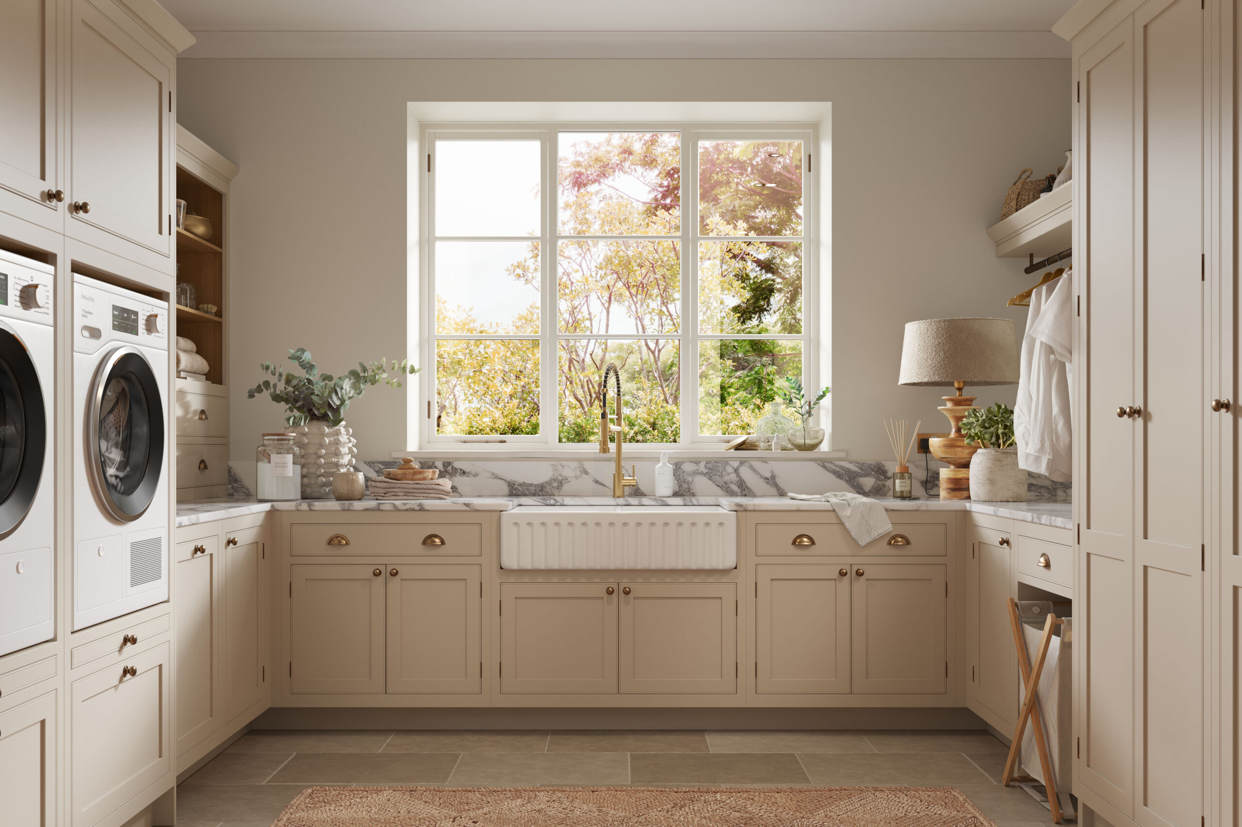 Luxury utility room with marble worktops, shaker cabinetry, and large window