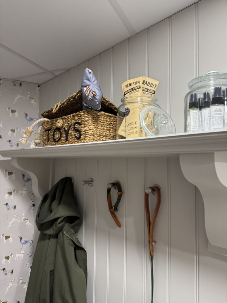 Harvey Jones bspoke boot room and pet kitchen with shelf storage for treats, hooks for leads and tongue and groove panelling
