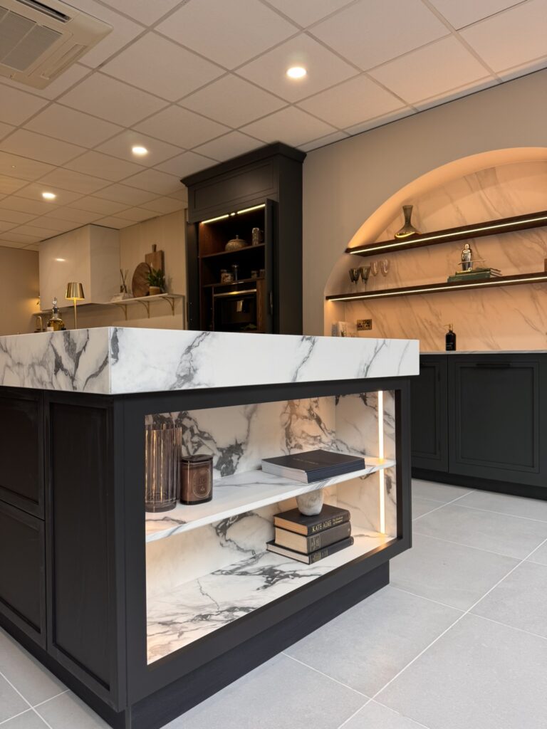 Luxury kitchen island with contrasting design and marble detail