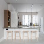 Shaker kitchen island with integrated seating