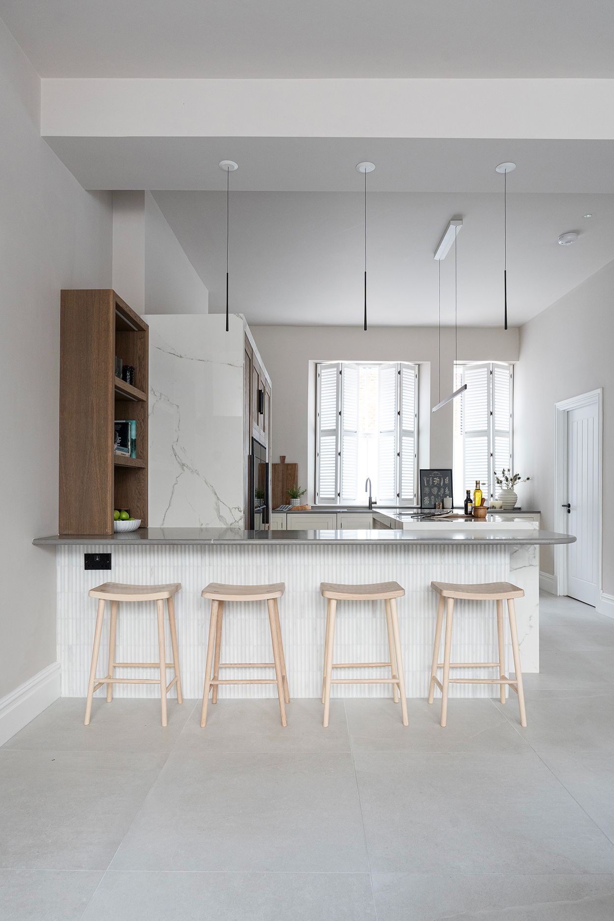 Shaker kitchen island with integrated seating