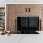 Shaker kitchen island with flush hob and marble worktop