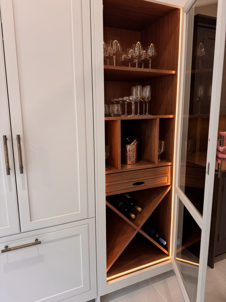 Bespoke wine and whiskey home bar with ambient lighting