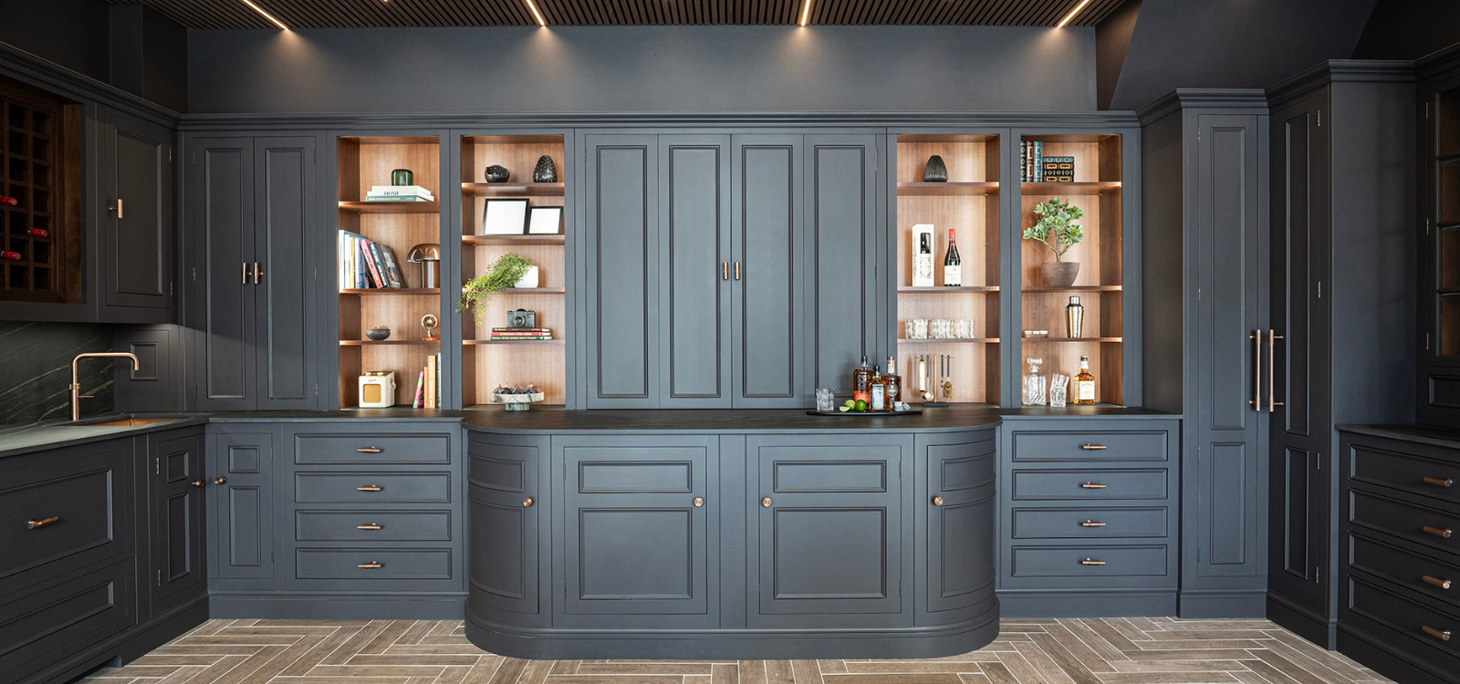 Dark kitchen design with luxury home bar