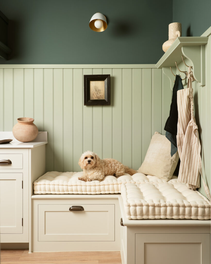 Boot room bench in green and white boot and utility room