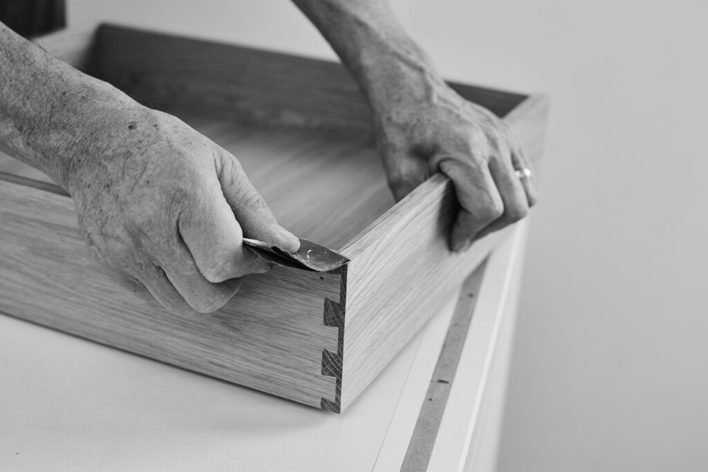 Handmade kitchen drawer with dovetail joints being crafted