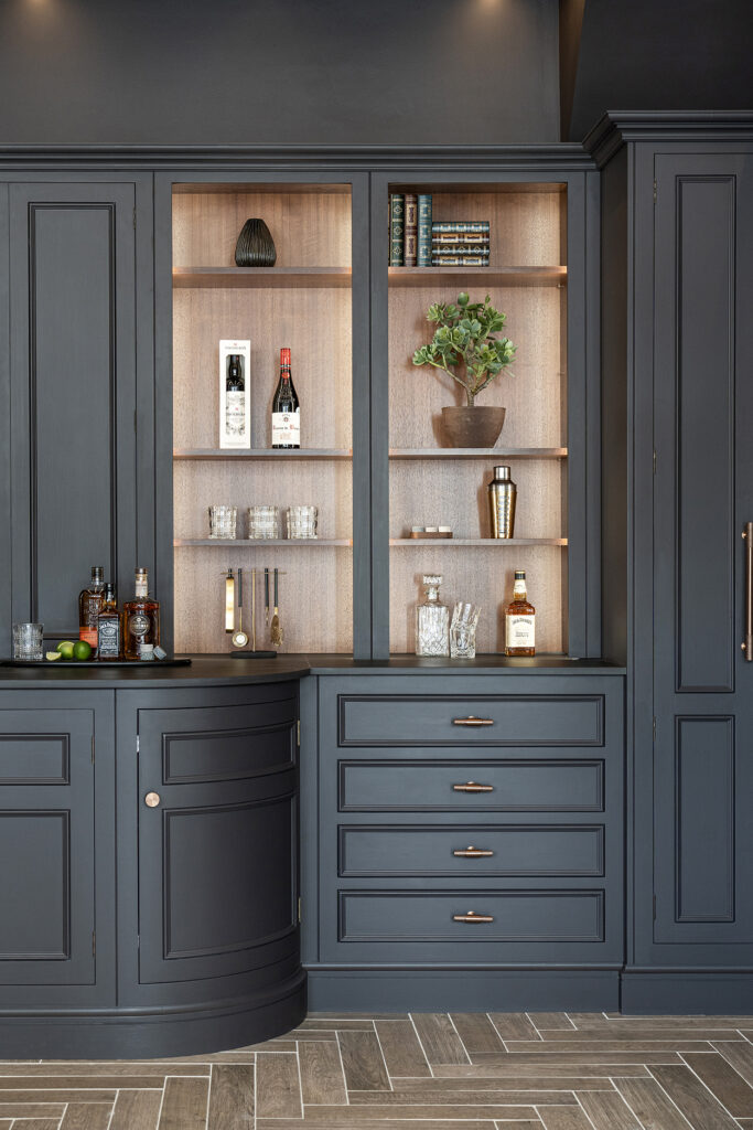 Dark home bar design with bespoke cabinetry