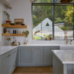 Garden and exterior views framed by the gable end kitchen window.