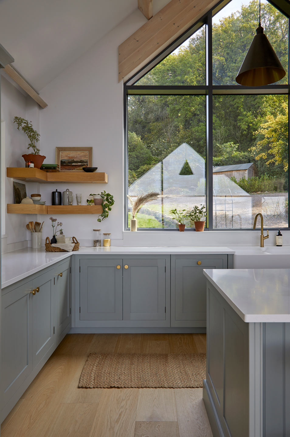 Garden and exterior views framed by the gable end kitchen window.