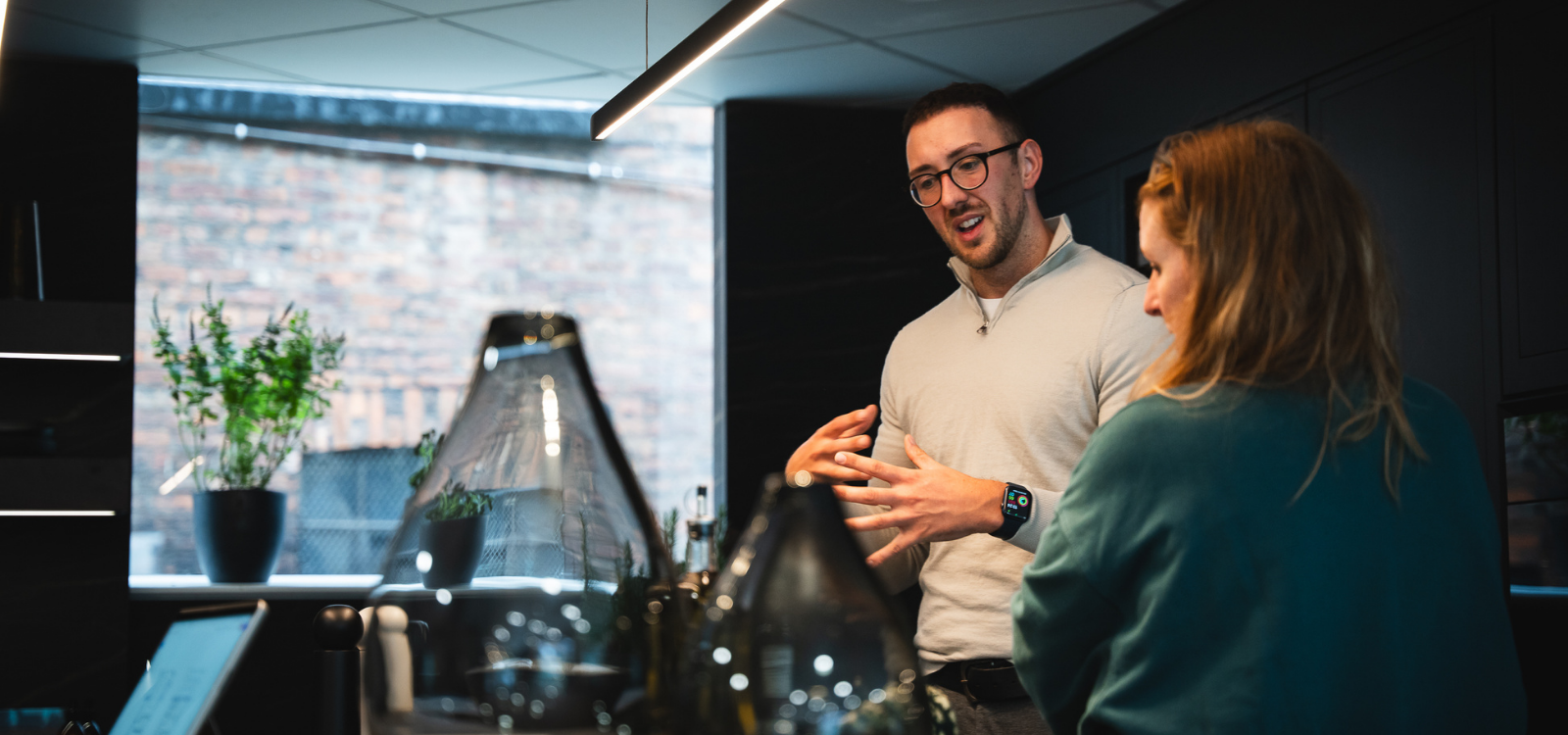 Kitchen designers discussing kitchen trends and bespoke kitchen design