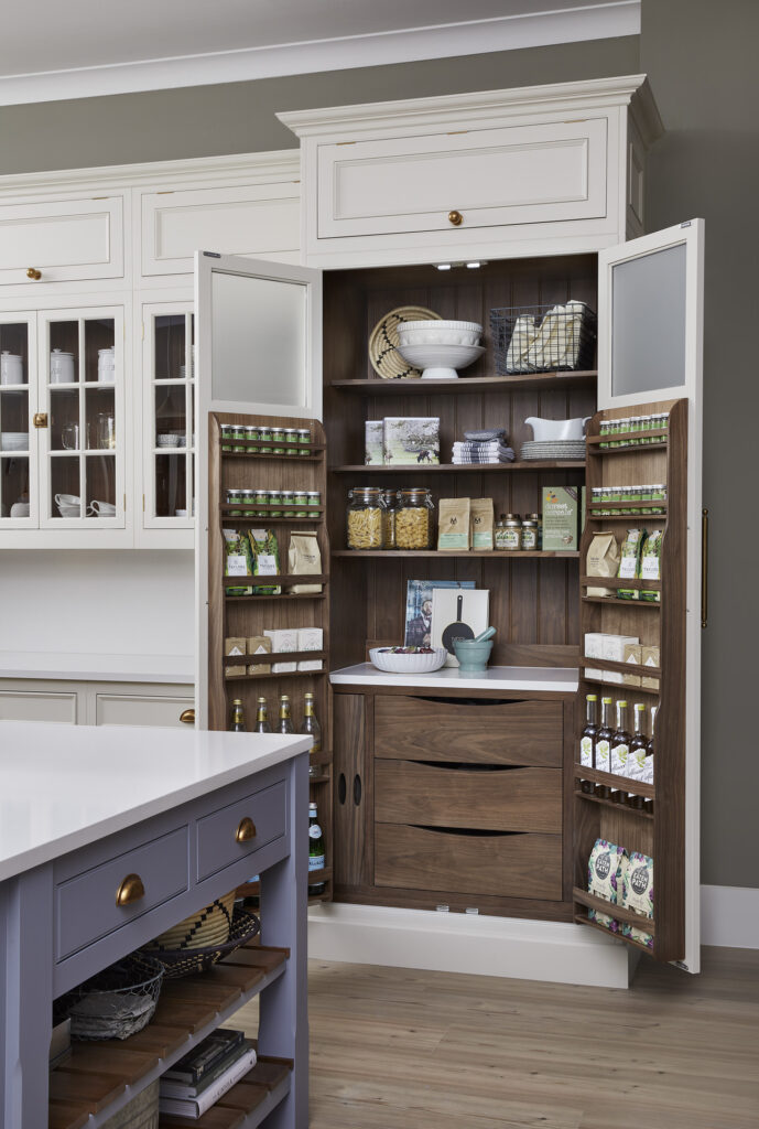 Kitchen larder cupboard with dark oak internal drawers and shelves