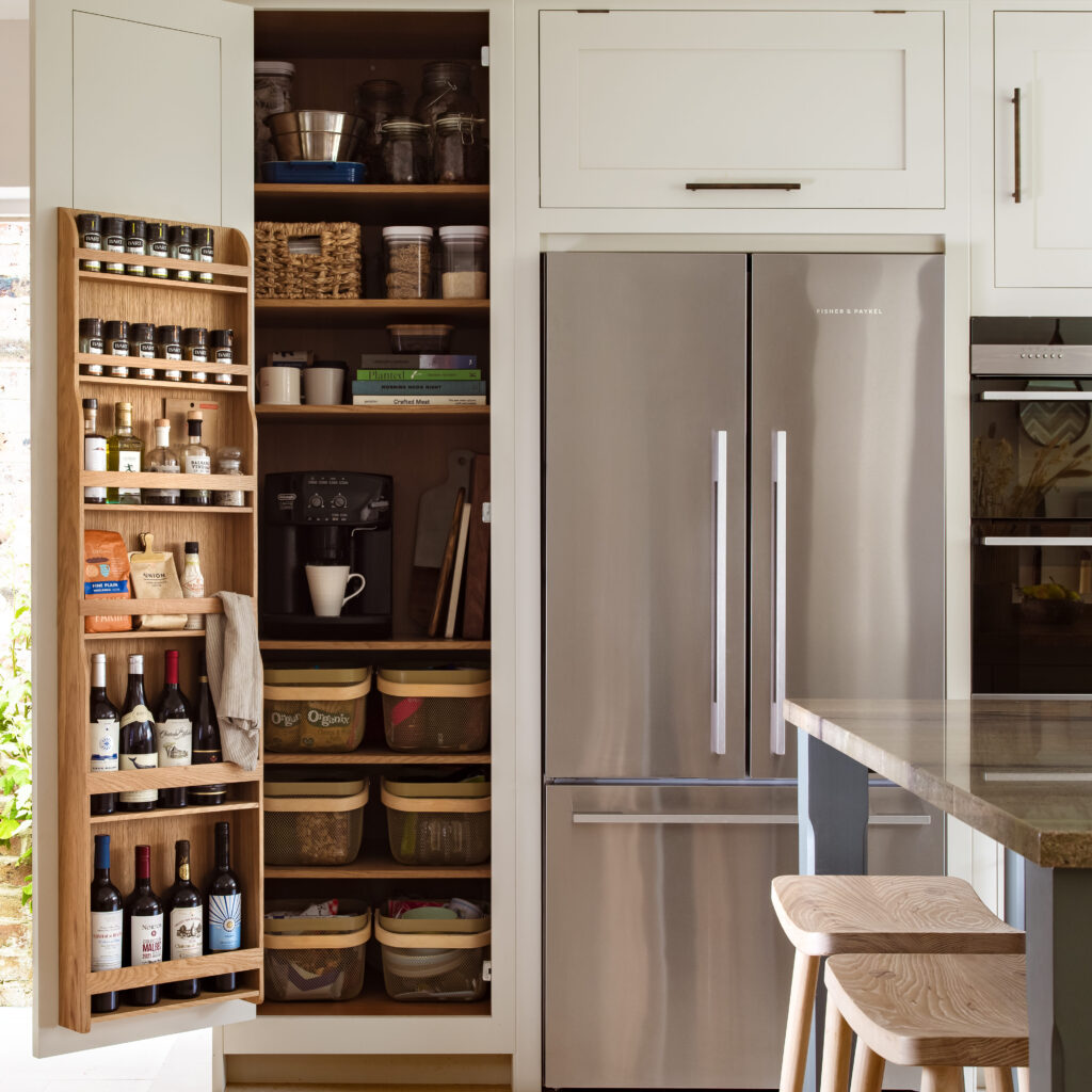 Full height pantry cupboard with organised shelving