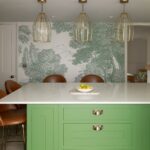 Social green kitchen island with white worktop