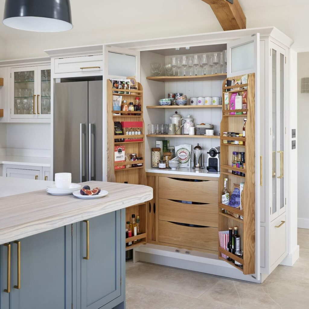 Large pantry larder with drawers and open shelving, designed with bespoke pantry ideas