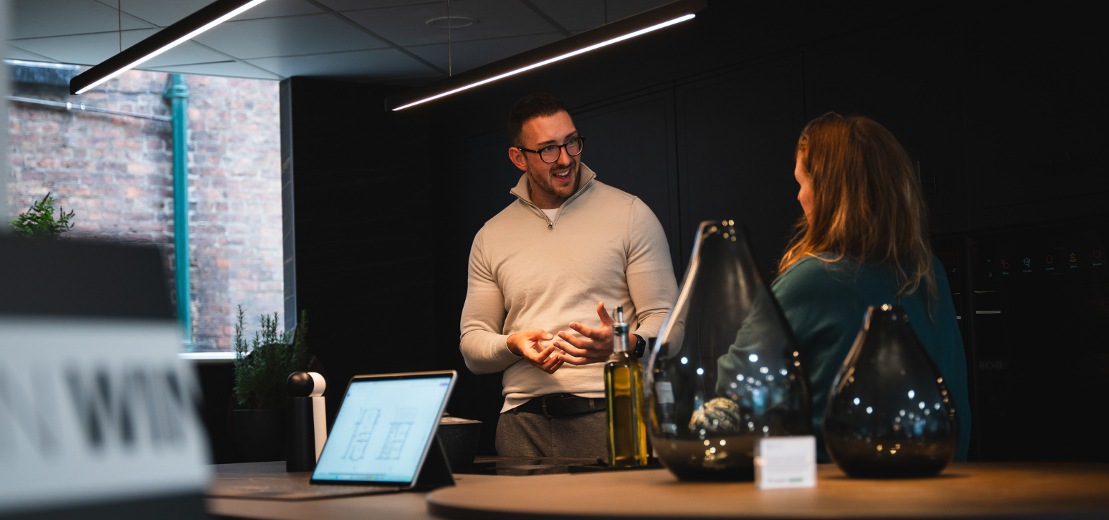 Luxury kitchen design process with expert designer in Harvey Jones showroom