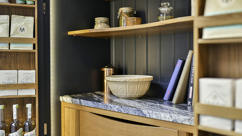 Pantry larder with marble worktop and integrated LED lighting