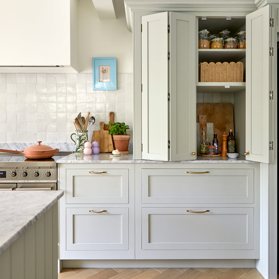 Modern shaker style kitchen with slim brass handles