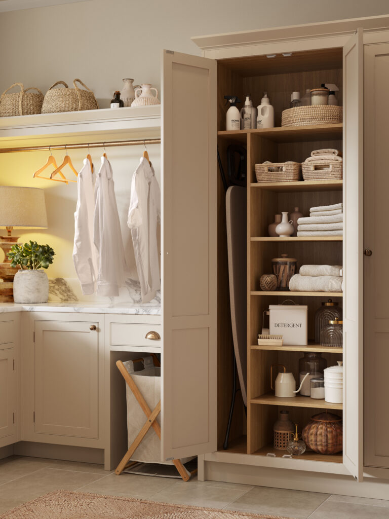 Bespoke utility boot room with tall vertical storage, shelves and hanging space
