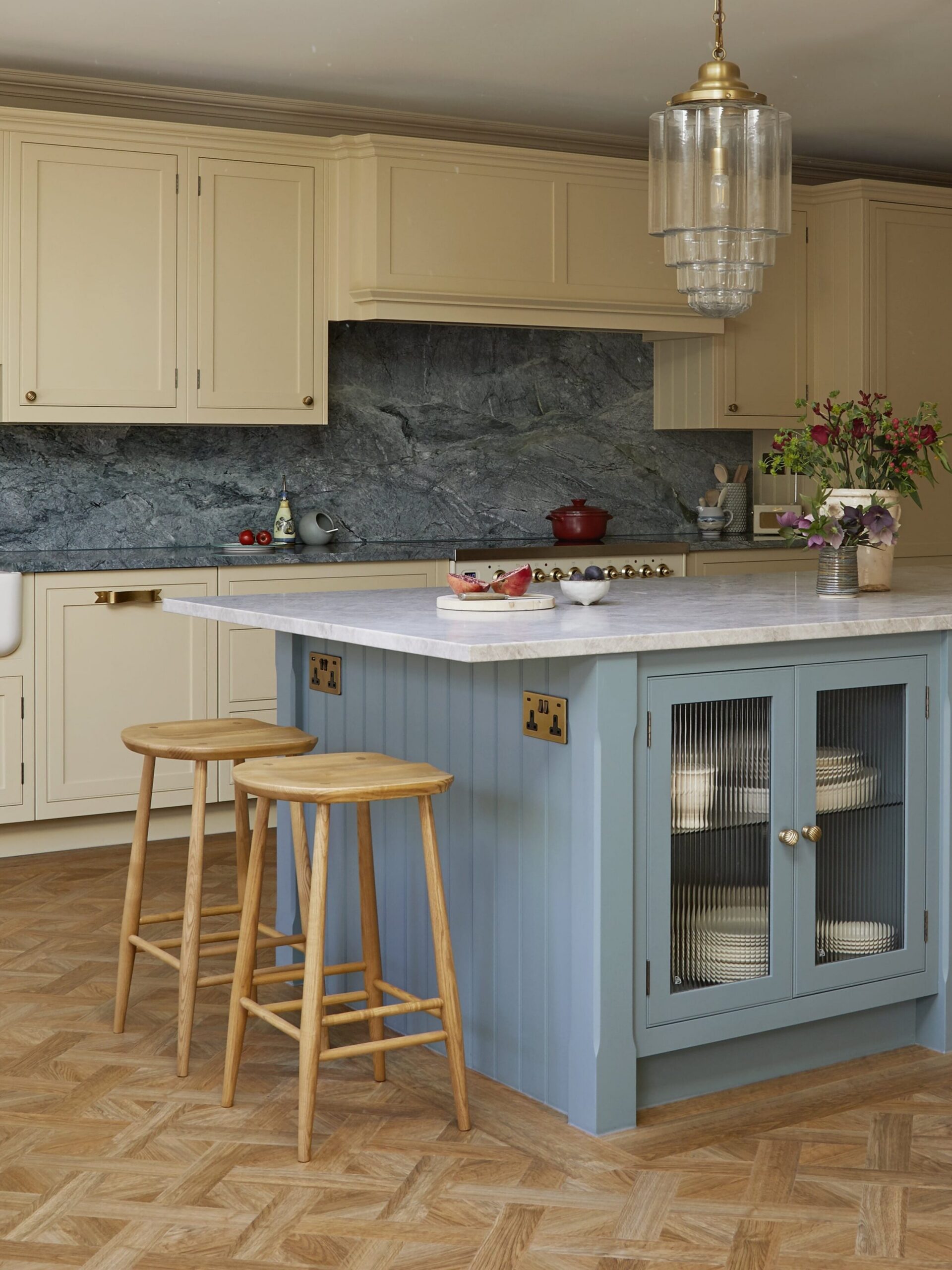 Light yellow and light blue kitchen with hidden storage features