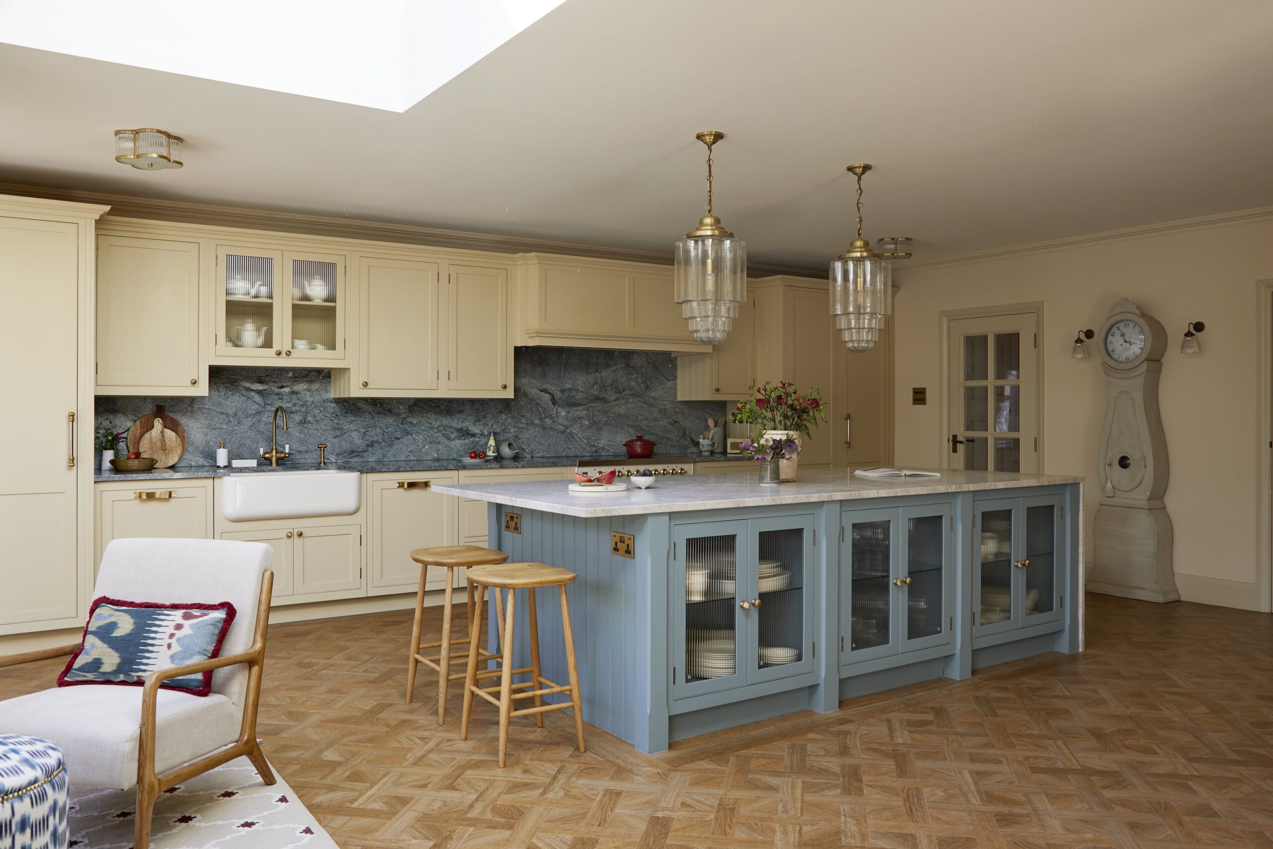 Bespoke kitchen with light yellow and light blue colour scheme