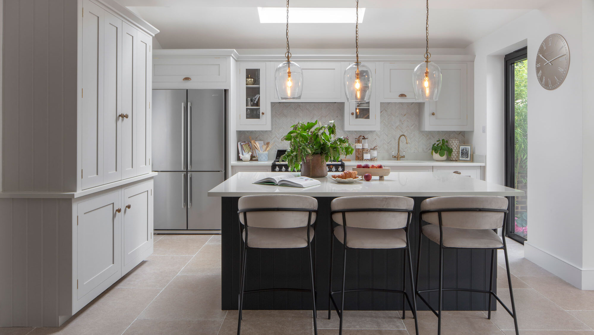 Modern shaker kitchen design with statement island and timeless cabinetry design