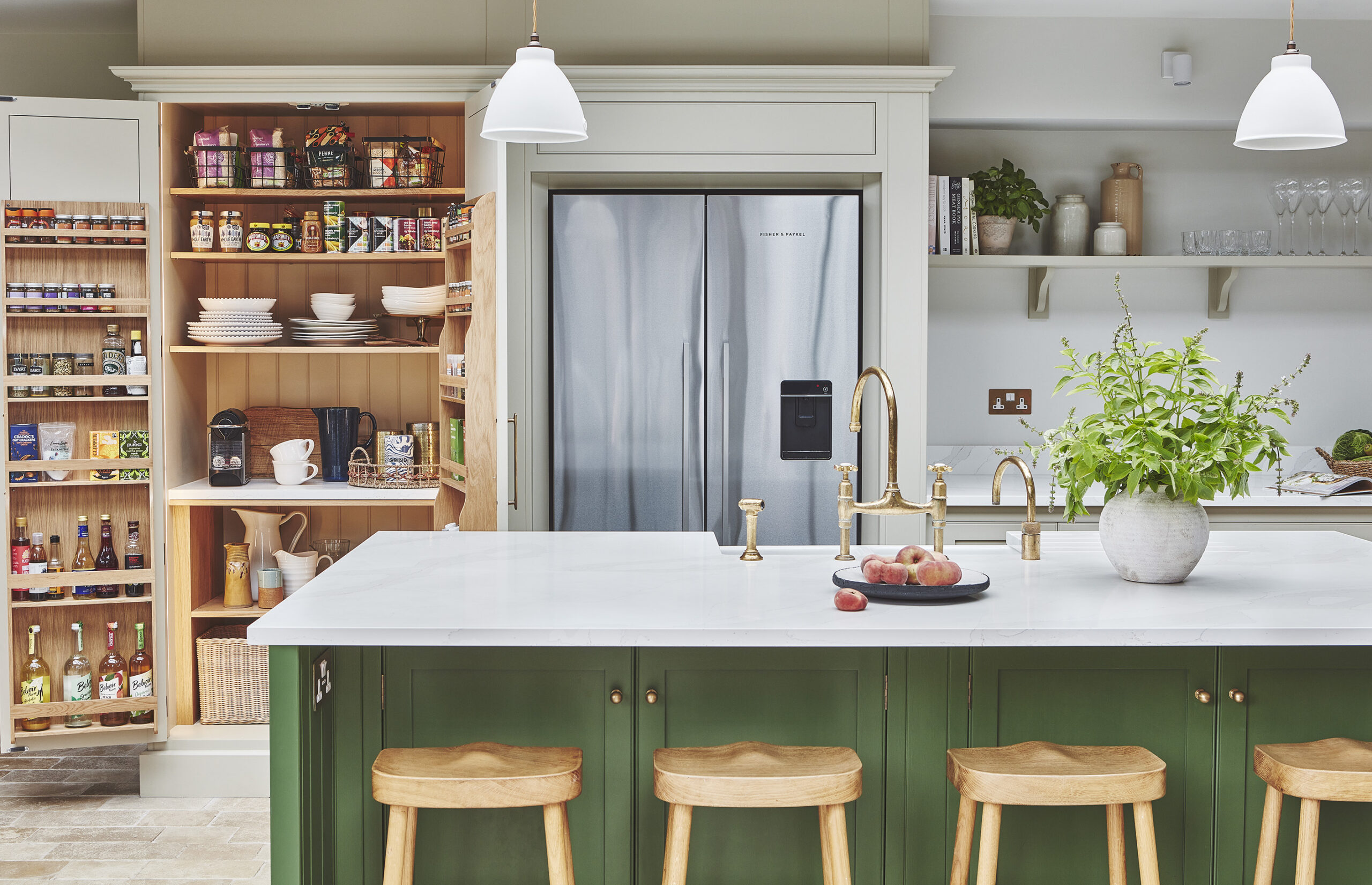 Multipurpose pantry ideal as a breakfast cupboard with worktop space, appliances and door storage