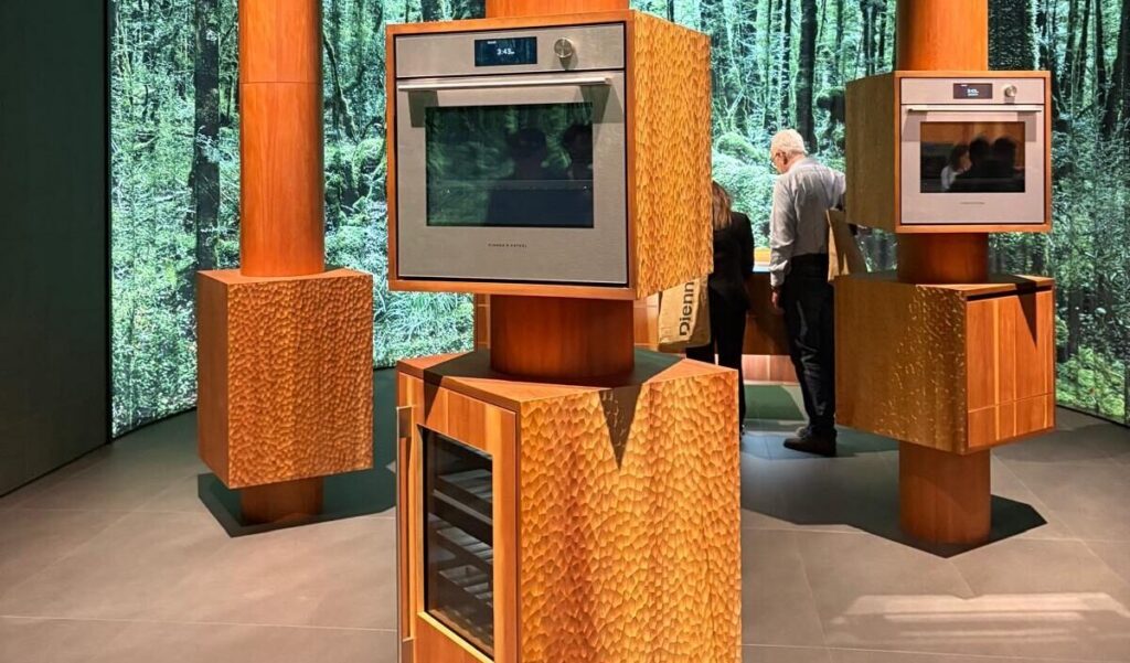 Fisher and Paykel EuroCucina stand with stacked ovens in nature themed design