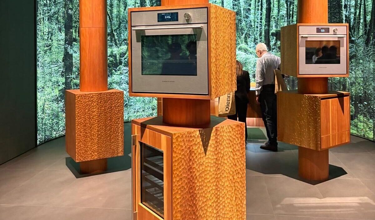 Fisher and Paykel EuroCucina stand with stacked ovens in nature themed design